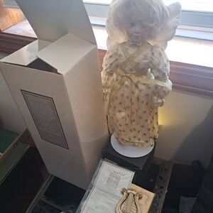 Avon Collectible Doll with Gold Accents